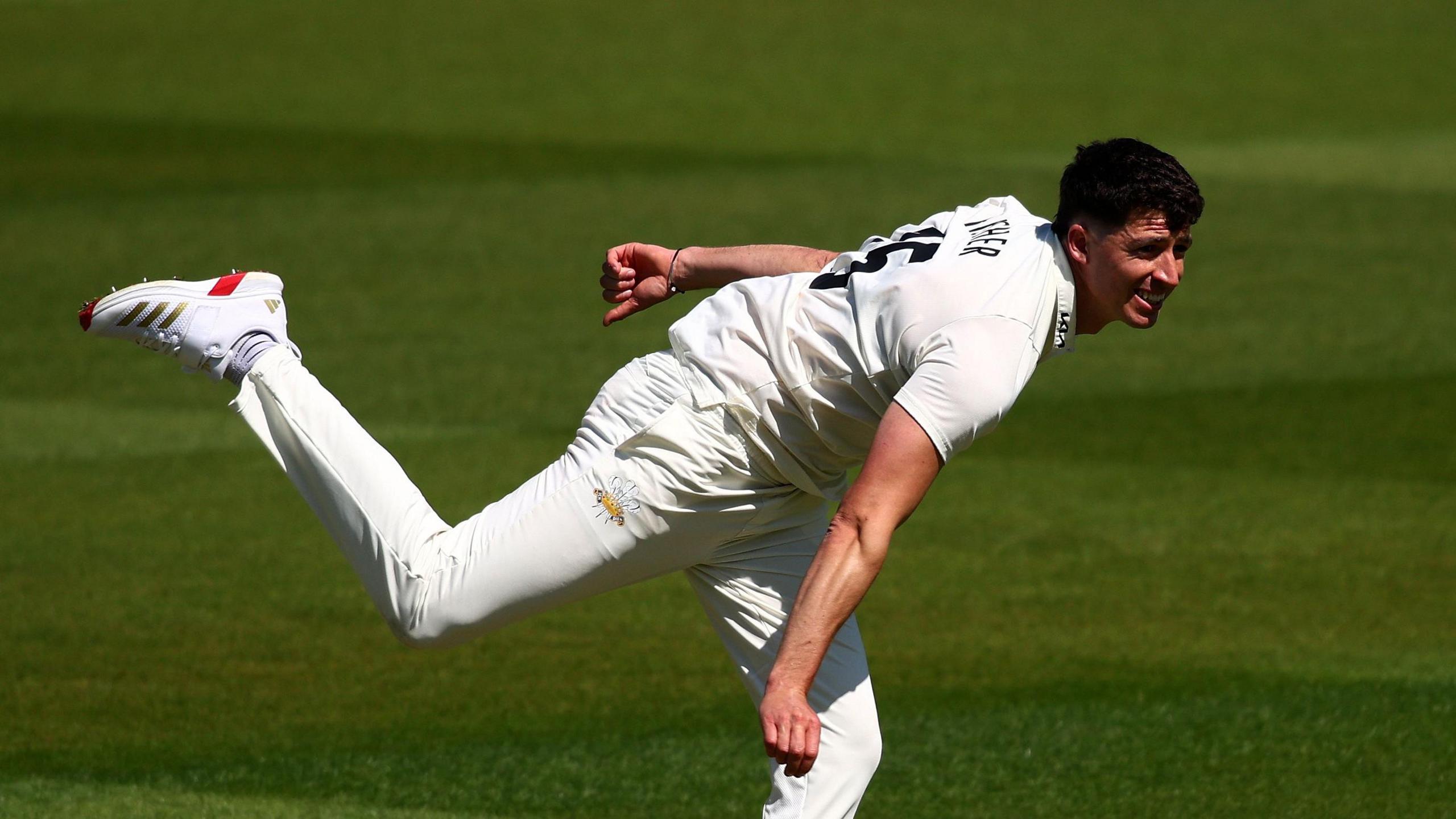 Surrey Dominates Day One: Fisher and Clark Shine in County Championship Clash