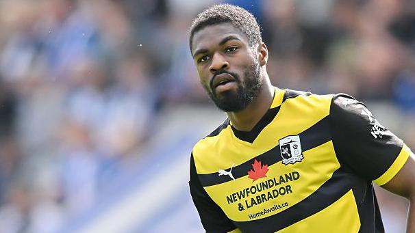Dundee Secures Emile Acquah: A New Chapter in Scottish Premiership