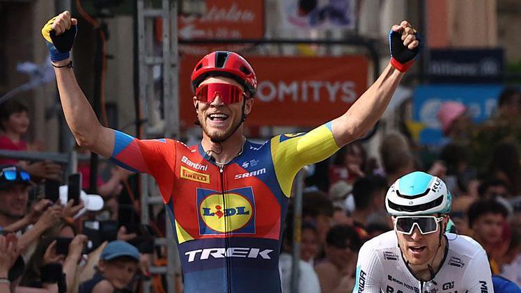 Jonathan Milan Claims Stage Two Victory at Criterium du Dauphine, Secures Yellow Jersey