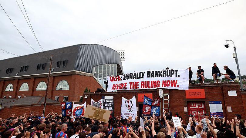 Crystal Palace Fans Rally Against UEFA's Conference League Demotion Decision