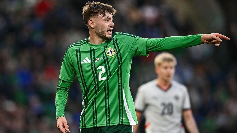 Conor Bradley Returns to Northern Ireland Squad Amid Injury Concerns for Charles