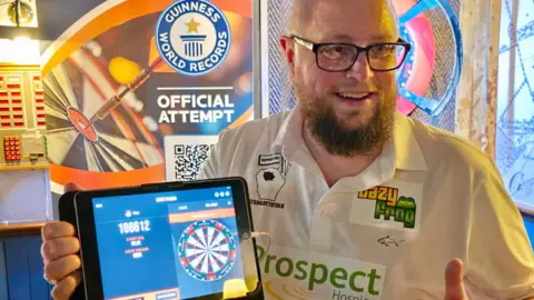 Tom Barkham's Extraordinary 12-Hour Darts World Record Triumph