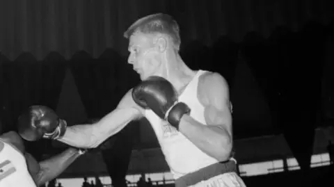 Legendary Scottish Boxing Champion Dick McTaggart Passes Away at 89: A Tribute to His Olympic Glory and Legacy
