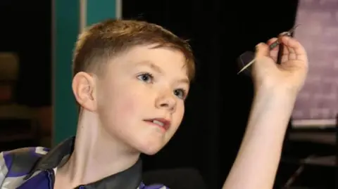 Rising Star George: The Teenage Darts Prodigy Set to Conquer the Professional Scene