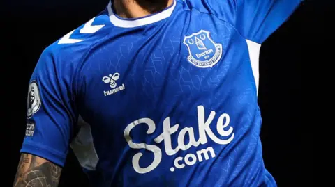 Everton's Major Sponsor Stake Withdraws from UK Amid Gambling Ad Controversy