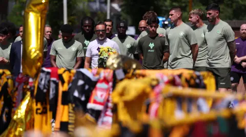 Wolves and Liverpool Unite in Mourning the Loss of Diogo Jota