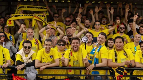 Spanish Fans Transform Harborough Town into a Global Football Hub
